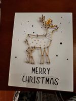 Weihnachtsdeko mit Hirsch, beleuchtet