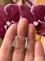 Superbes boucles d'oreilles serties de zirconiu...