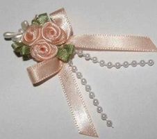 Noeud triple roses + perles SAUMON