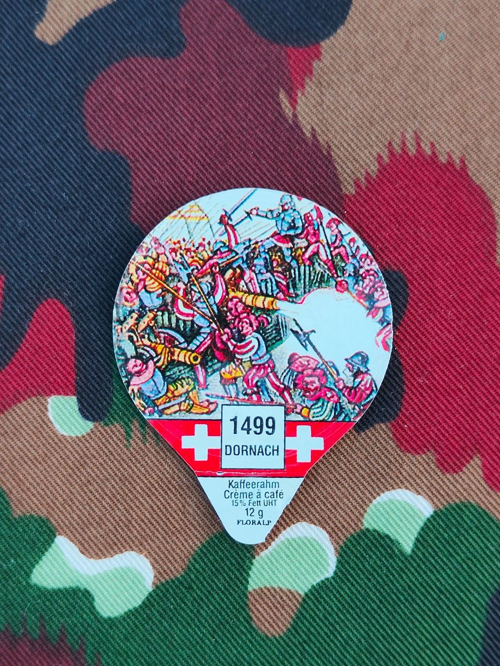 Kaffeerahmdeckel: Kaffeerahmdeckel 1499 DORNACH – Gebraucht aus Bauma von SwissMilitaria