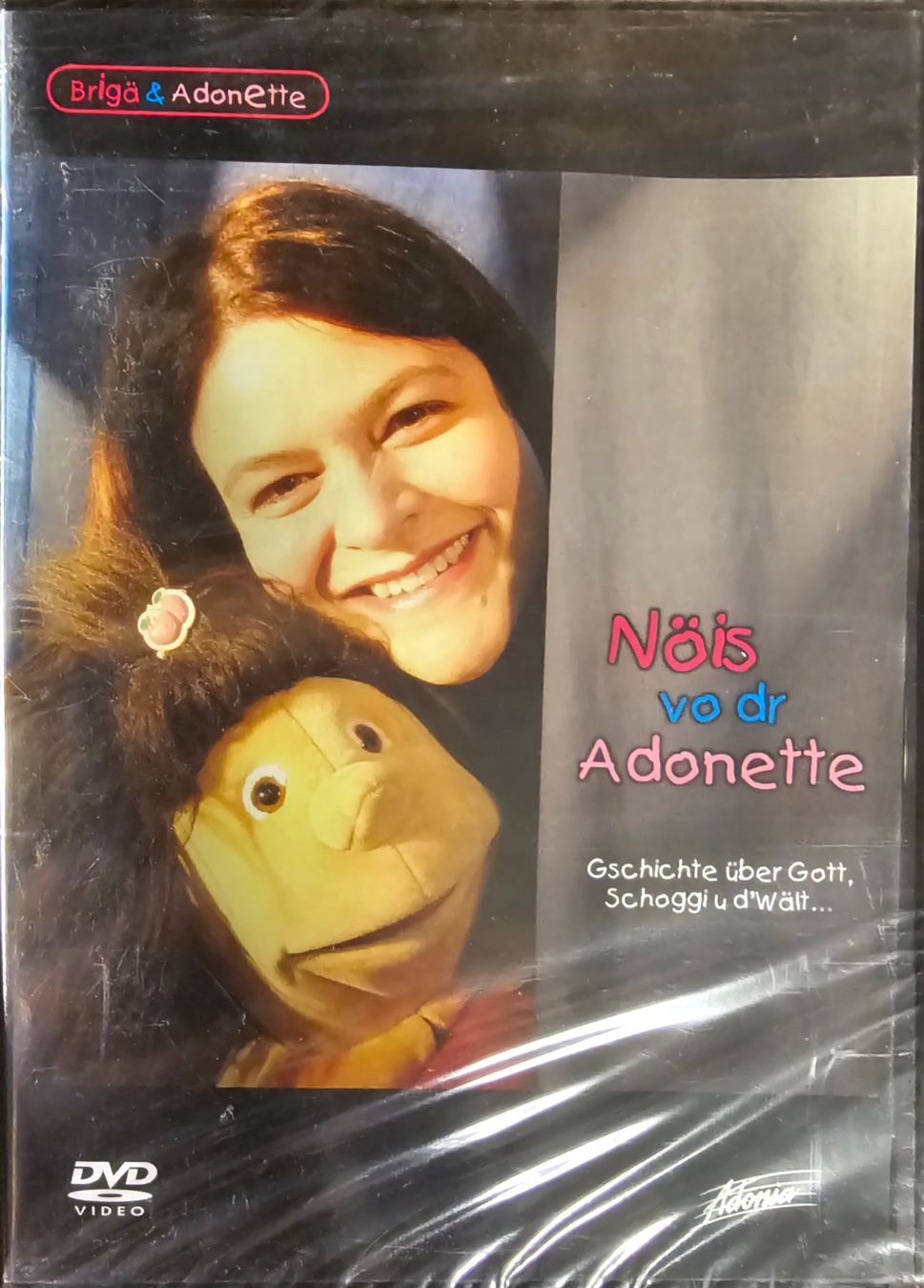 Tutti i DVDs: Brigä & Adonette - Nöis vo dr Adonette – Nuovo e nell'imballaggio originale da Wahlen b. Laufen venduto da Cg10