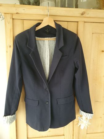 Blazer, M