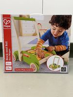HAPE Holzbauwagen 21tlg. mit Bausteinen