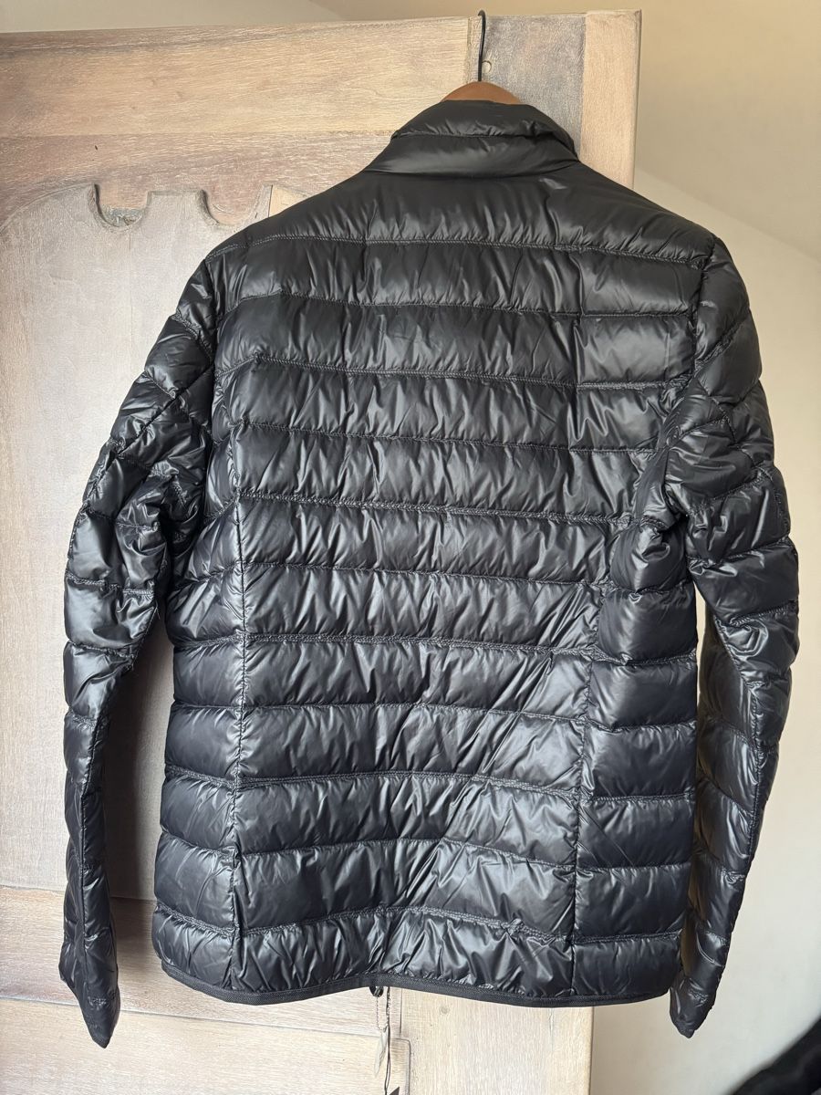 Armani Giacche: Doudoune EA7 Emporio Armani noire, taille M, impeccable – Usato da Morges venduto da Alexys23 1