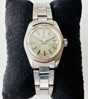 REVUE Swiss Made Mécanique 24mm 100% originale en bon état