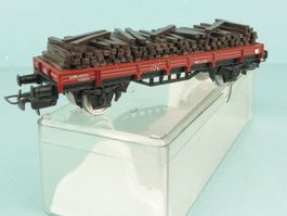 Electrotren 1015 RN Flachwagen mit Gleisschwellen beladen