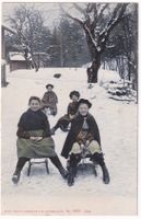 Personnages enfant et femme en luge N° 3607