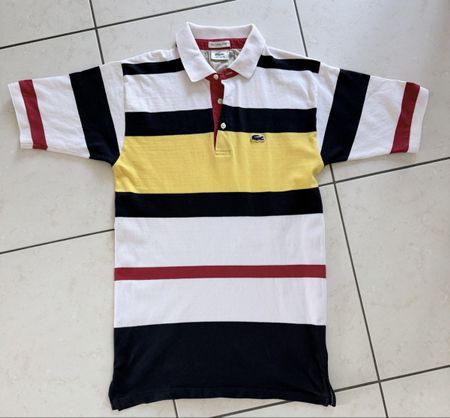 Polo Lacoste rayé blanc noir jaune rouge taille M