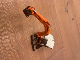 Siku Bagger Schaeff orange Modellauto gebraucht gute Zustand