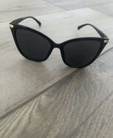 Schwarze Sonnenbrille ungetragen 