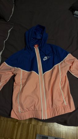 Nike Windrunner Jacke blau rosa Reissverschluss Damen