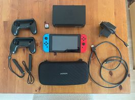 Nintendo Switch OG + custodia + vetro + grip + gioco