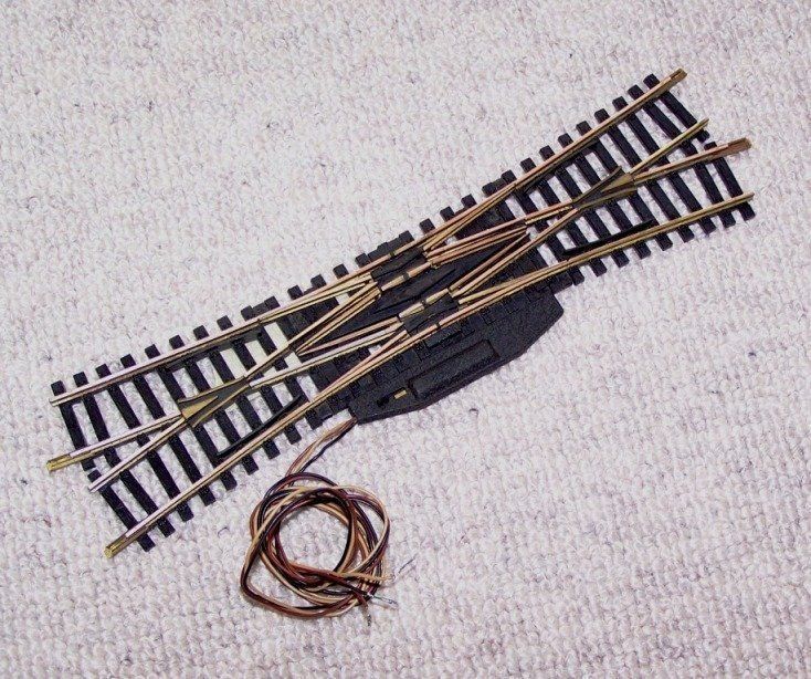 Fleischmann Modellini di ferrovie: Fleischmann HO 6066: Doppelkreuzungsweiche elektr., 2,7 mm – Usato da Brüttisellen venduto da Rentner44zh 1