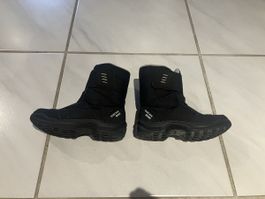Quechua Winterstiefel schwarz gefuettert Gr. 31