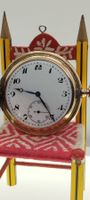 montre de poche dorée