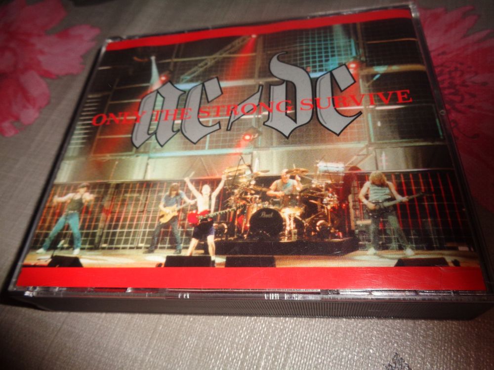 AC/DC - Only the Strong Survice CD (Gebraucht) in Olten für CHF 8 – mit ...