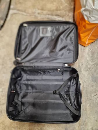 Kleiner Hartschalenkoffer auf 4 Rollen  Rot