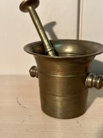 Mortier et pilon anciens en laiton