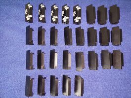 Lego schwarze Burgteile mit Ziegelaufdruck