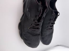 Schwarze Skechers Schuhe