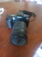 Appareil photo Minolta Maxxum 7xi avec objectif Sigma 28-200