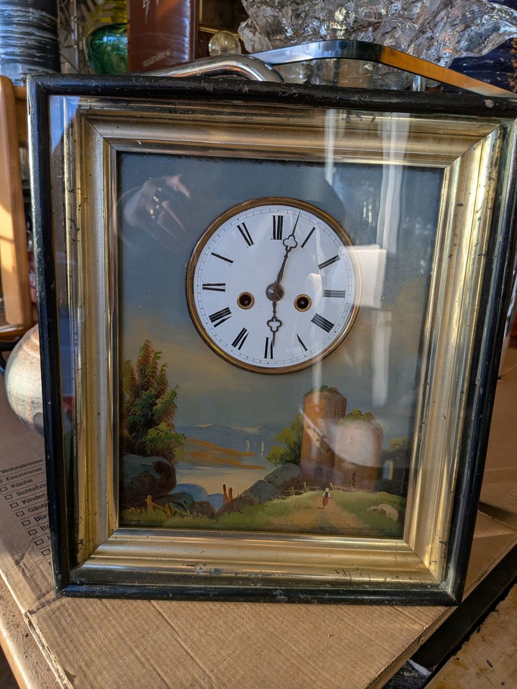 Orologi da terra & Orologi da parete: Antike Bilderuhr – Usato da Emmen venduto da Brockofsky