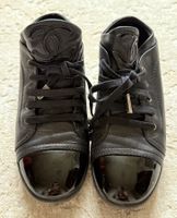 Chanel schwarze Sneakers, Leder