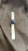 Apple Watch S9 GPS, starlight, beiges Sport-Armband 41mm