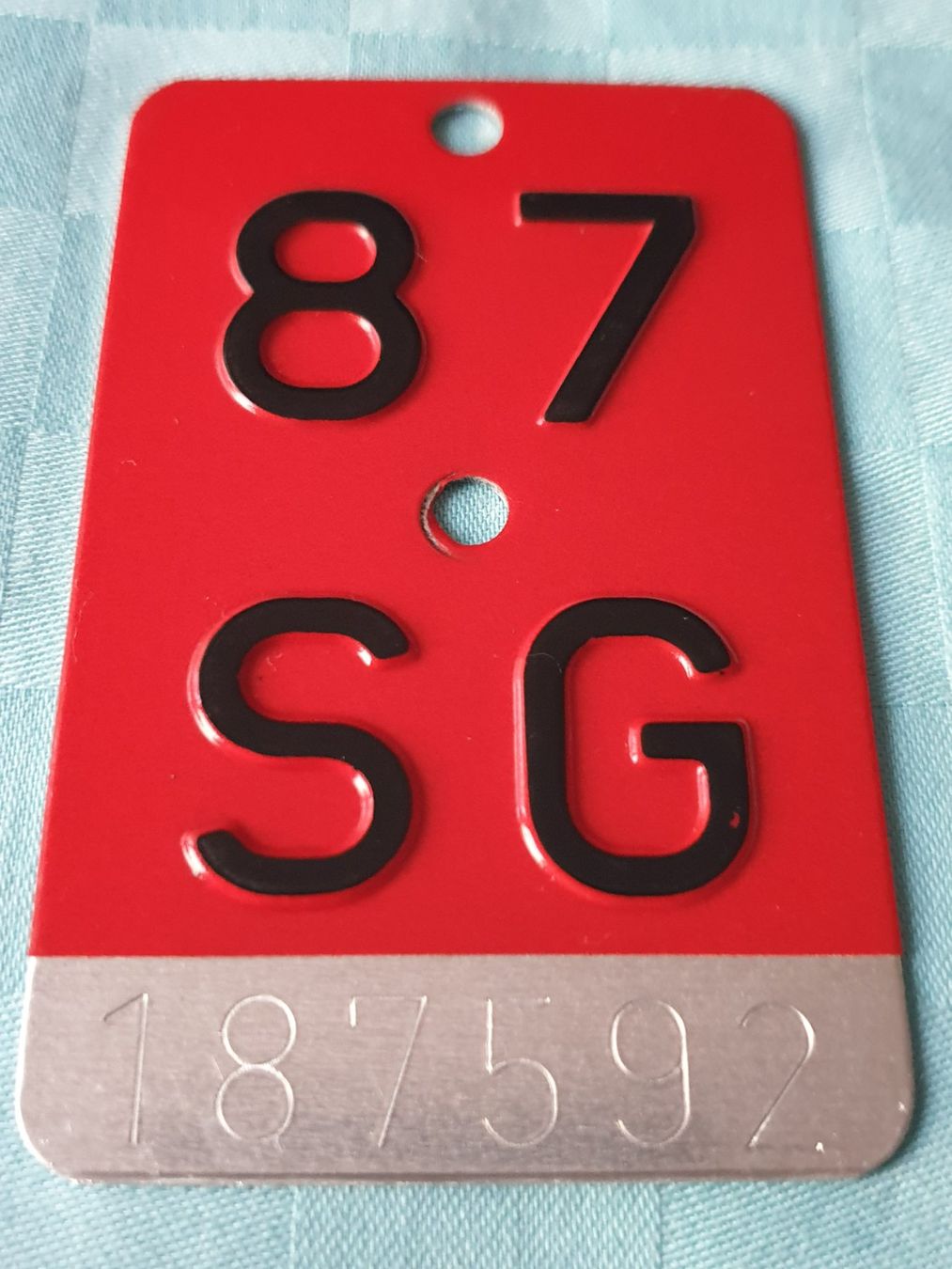 Insegne: Velonummer SG 87 – Usato da Mörschwil venduto da spirspi