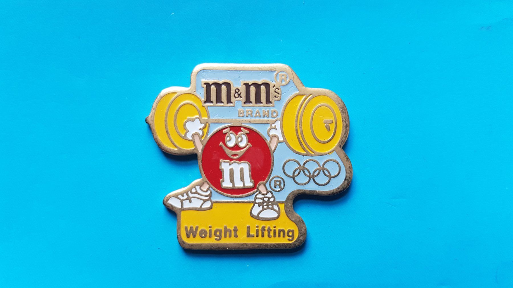 Placchette & Badge: Pins - Olympiade 1992 / M&M's – Usato da Reinach BL venduto da Dexy62