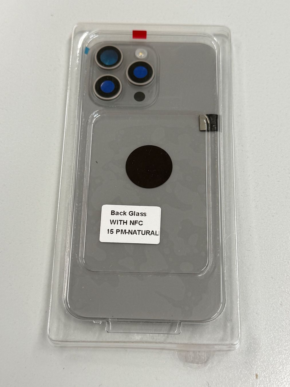 Apple Telefoni cellulari / Smartphones: Vitre Arrière pour iPhone 15 Pro Max avec NFC | Flash – Nuovo e nell'imballaggio originale da Zug venduto da ElPhone 2