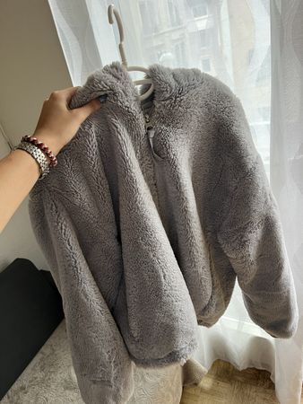 Veste fausse fourrure grise 
