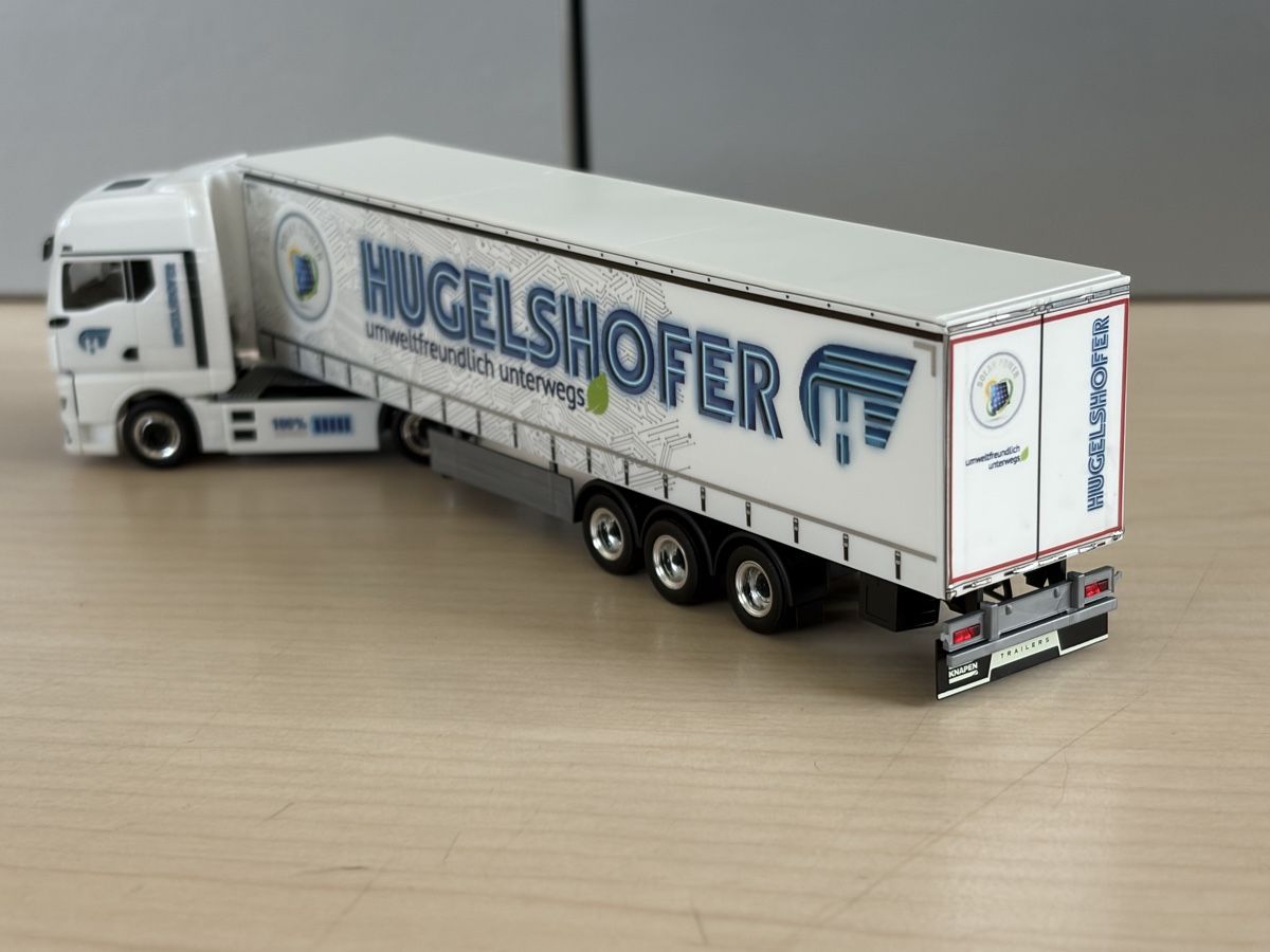 Herpa Modellini d'auto: MAN TGX GX ELECTRIC Hugelshofer – Nuovo e nell'imballaggio originale da Felben-Wellhausen venduto da Mobil01 1