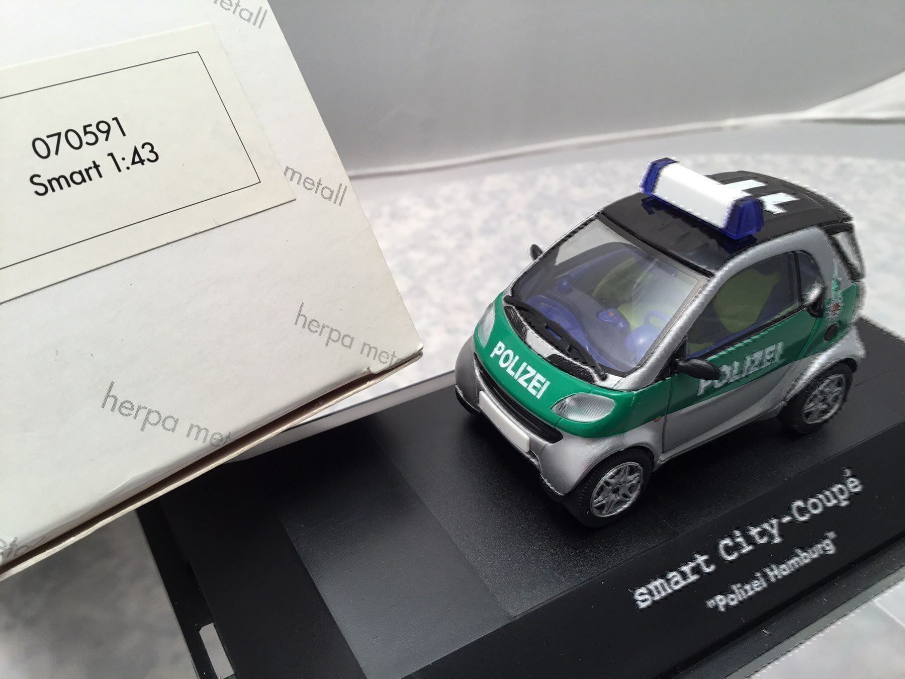 Smart Modellini d'auto: Polizei SMART – Nuovo e nell'imballaggio originale da Erlenbach im Simmental venduto da Model_box 5