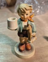 ​Goebel Hummel Kerzenhalter „Junge mit Schaukelpferd .HUM117