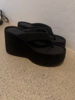 Tongs compensées noires taille 37 bon état