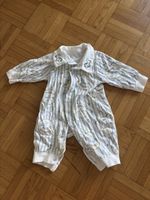 Combinaison bébé motifs rayures chevaux à bascule