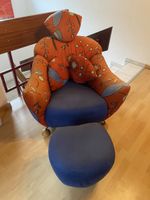 Bequemer Sessel mit Fussauflage