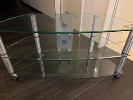 TV Möbel aus Klarglas mit Säulen aus gebürstetem Metall