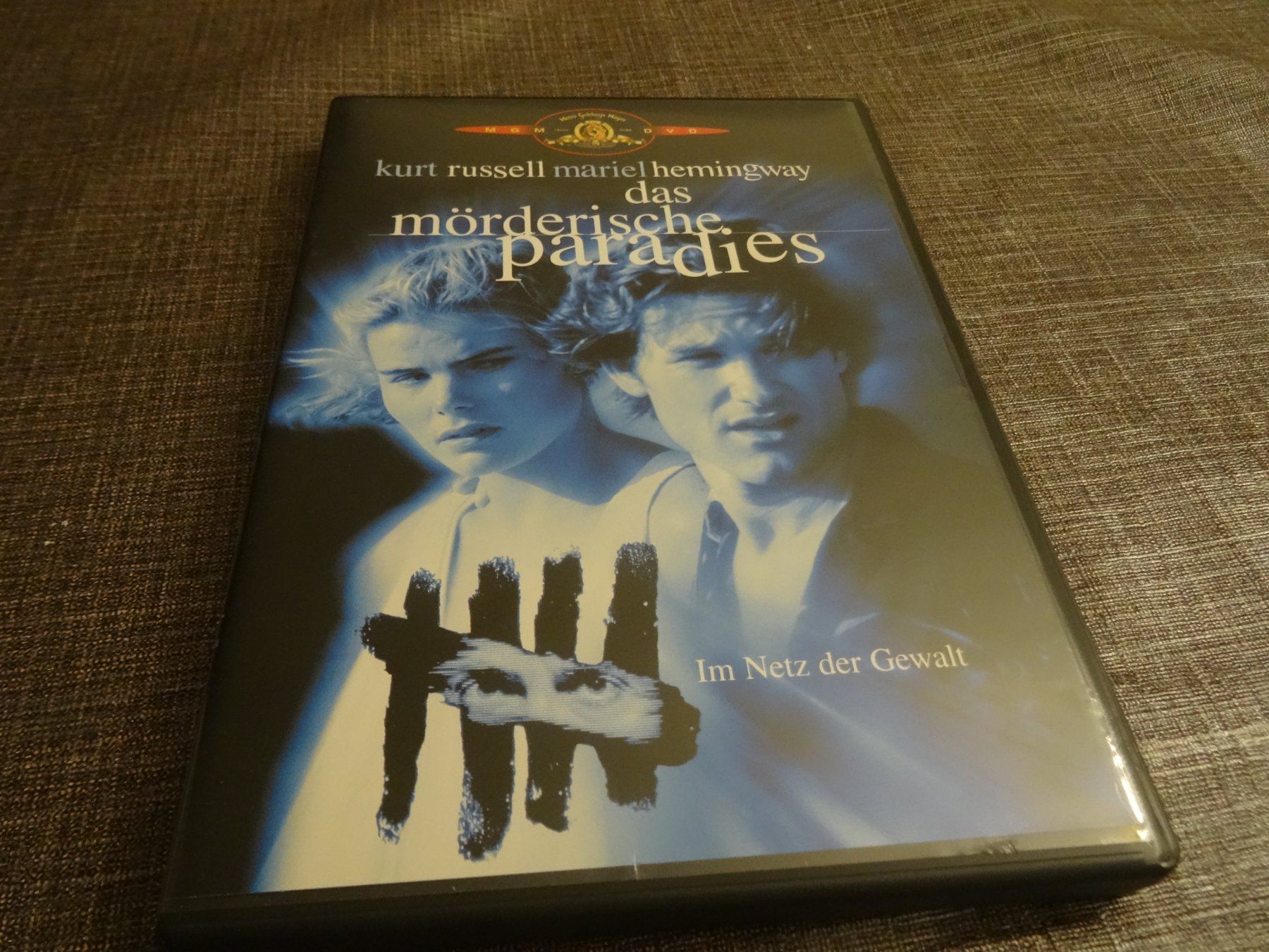 Tutti i DVDs: DVD Das mörderische Paradies Kurt Russell – Usato da Olten venduto da Disc-Verkauf