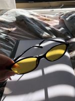 Lunettes monture noire verres jaunes état neuf