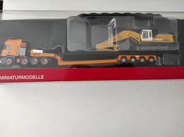 Scania TL Schwerlast-Set "Schaumann7Müller" von Herpa 1/87