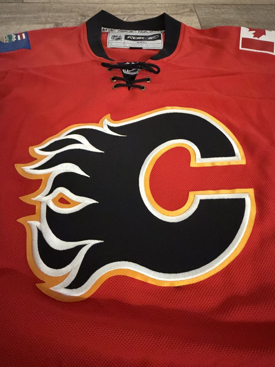 Leibchen & Hosen: NHL Calgary Flames Trikot – Gebraucht aus Winkel von Derschweizerseller 3