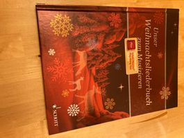 Unser Weihnachtsliederbuch zum Musizieren mit Schott App