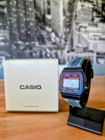 Neue Casio F91W – ungetragen / mit blauem LederArmband
