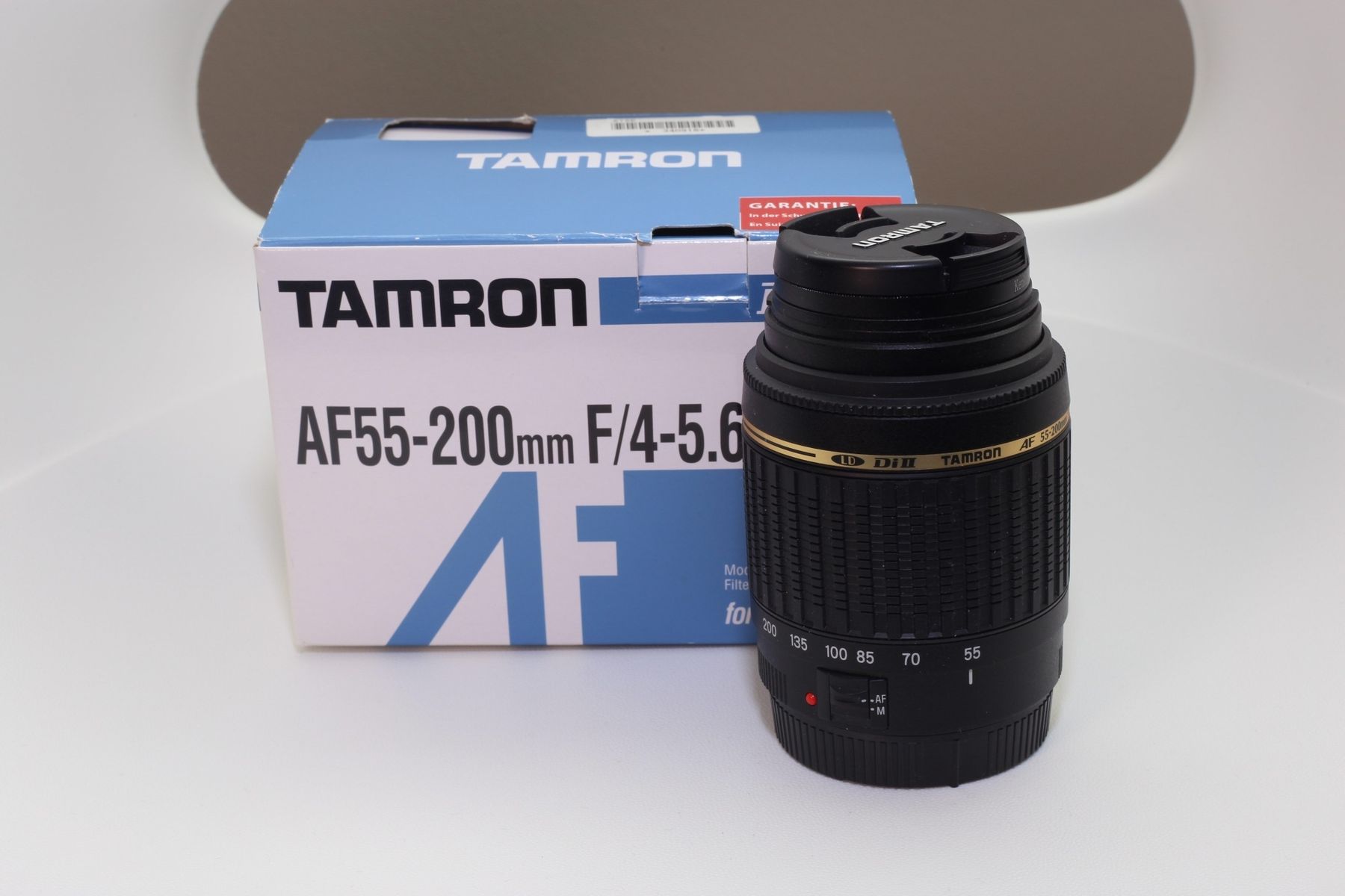 Tamron Obiettivi: Tamron AF 55-200 1:4-5,6 MACRO – Nuovo e nell'imballaggio originale da Luzern venduto da SIR_d8b8