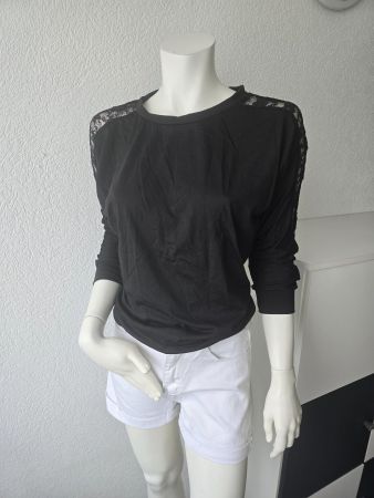 Pull noir et dentelle T-S Neuf
