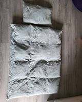 Kinderduvet und Kissen mit passenden Anzügen