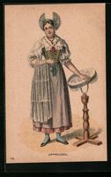 Junge Dame in Appenzeller Tracht neben e