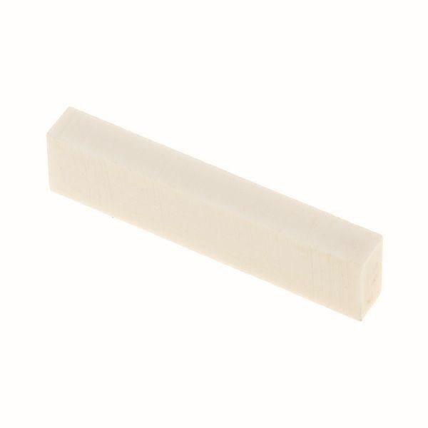 Strumenti musicali: Bone Nut Blank / Knochen Sattel Rohling – Nuovo e nell'imballaggio originale da Luzern venduto da MusikElektronikShop 1